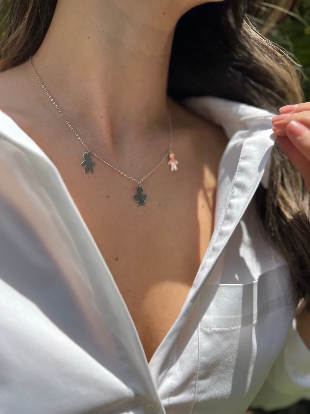 Cadena de plata con dijes
